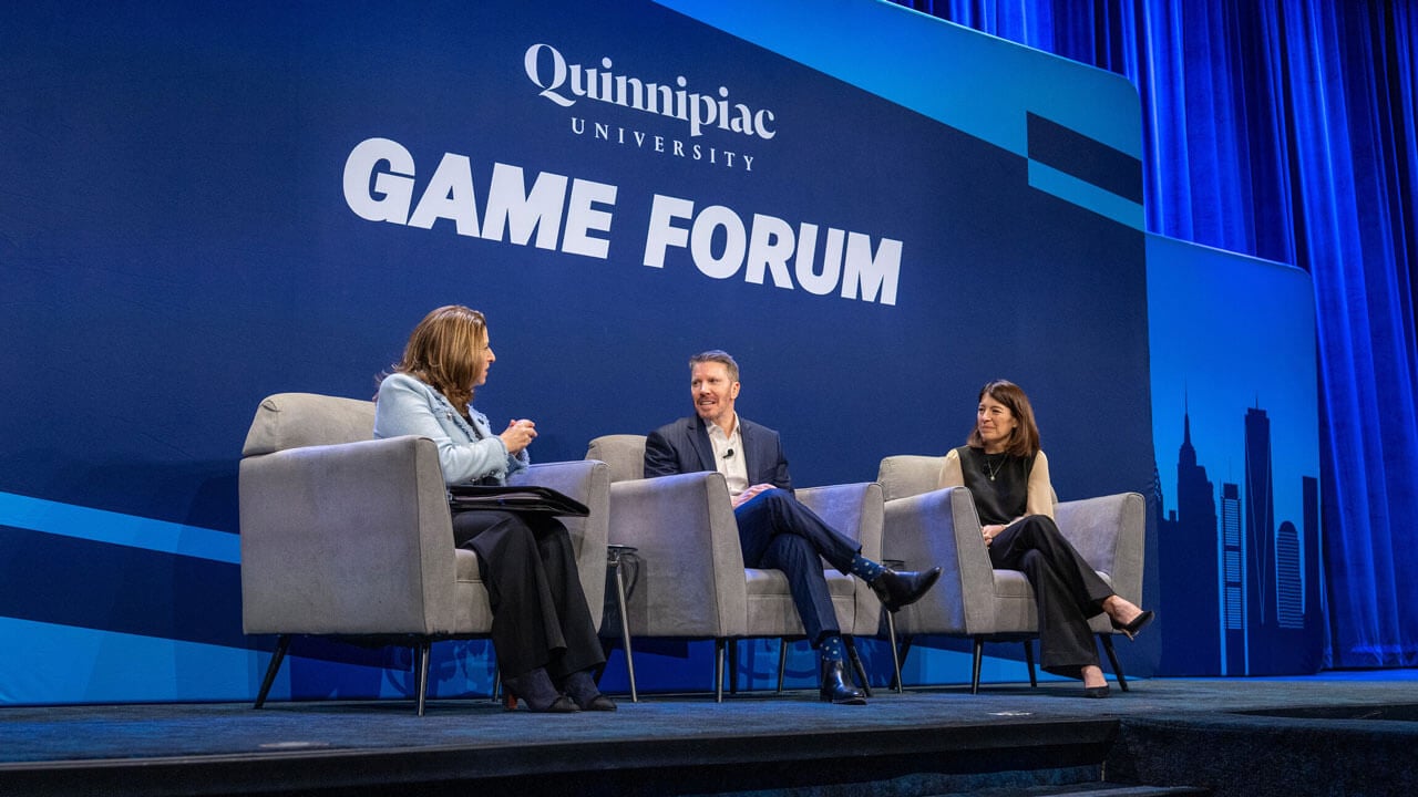 The game forum stage with moderator Dean Holly Raider and guests