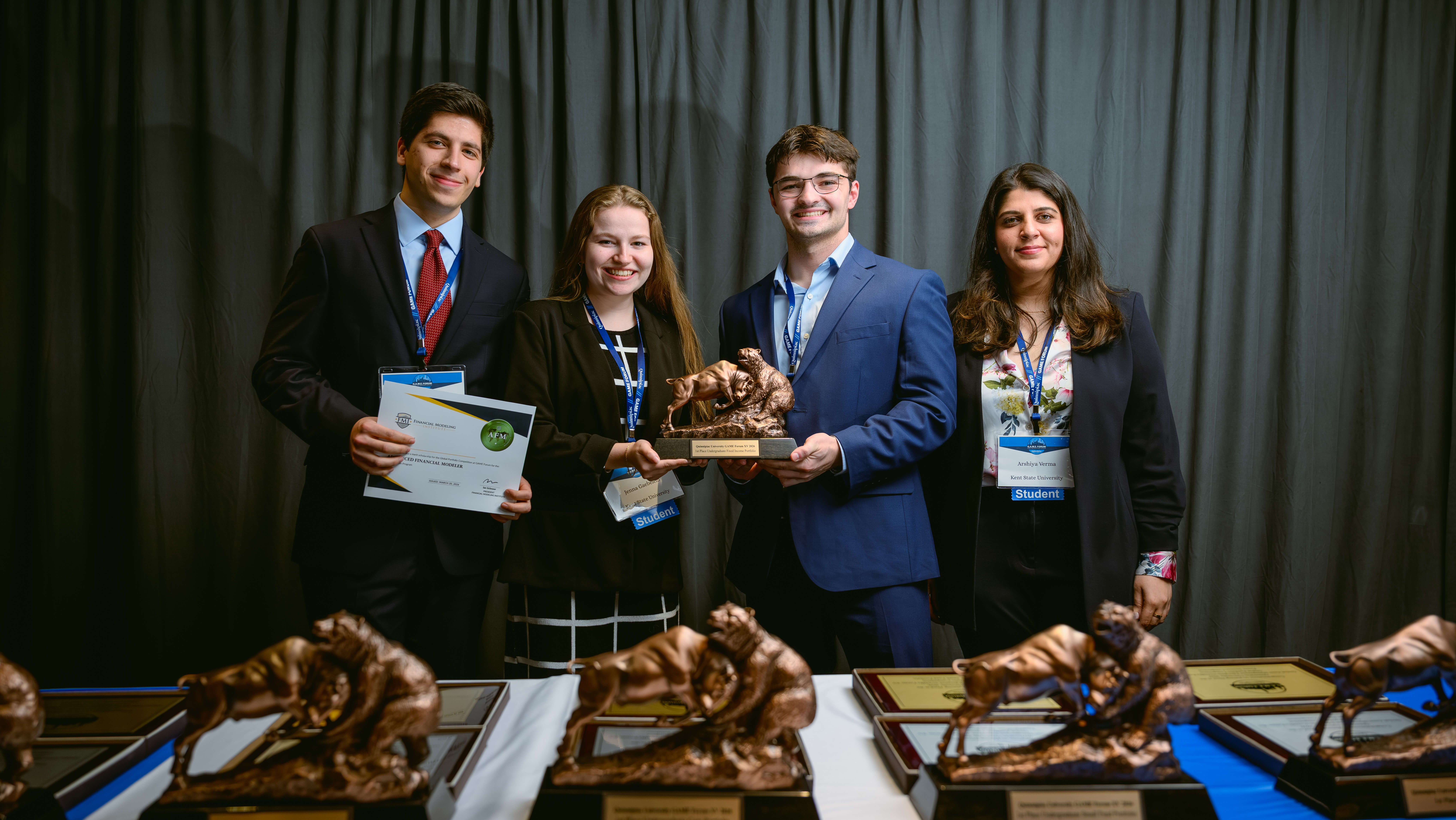 Students recognized as awardees in the Undergraduate Fixed Income category pose with their award during the Forum Poster Competition Awards Ceremony.