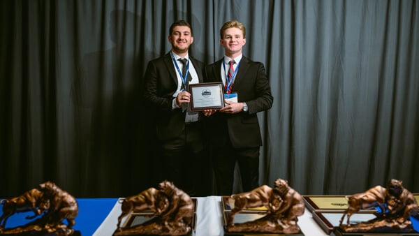 Undergraduate Growth category awardees pose for a photo on stage at the Forum Poster Competition Awards Ceremony.