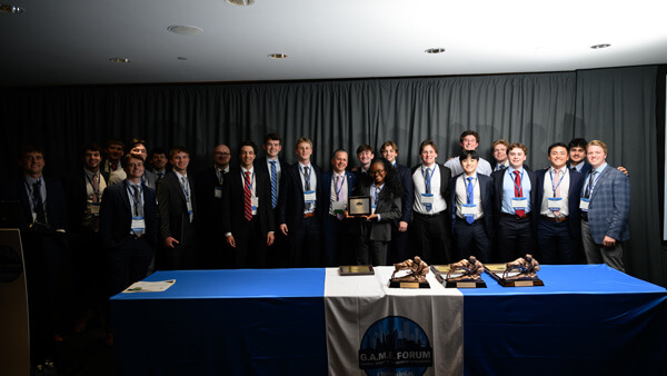 Student and faculty awardees in the Undergraduate Core category pose on stage with their recognition during the Forum Poster Competition Awards Ceremony.
