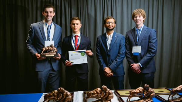 Undergraduate Growth category awardees gather for a group photo on stage at the Forum Poster Competition Awards Ceremony.