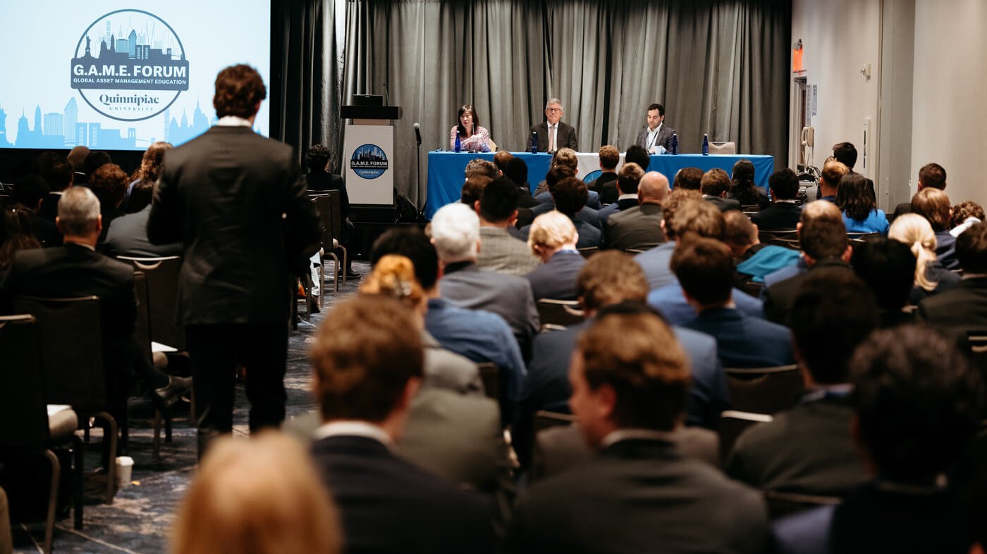 Panelists present a discussion focused on fixed income markets at GAME Forum.