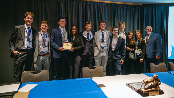 Poster Session awardees gather on stage with their award at the GAME Forum Awards Ceremony.